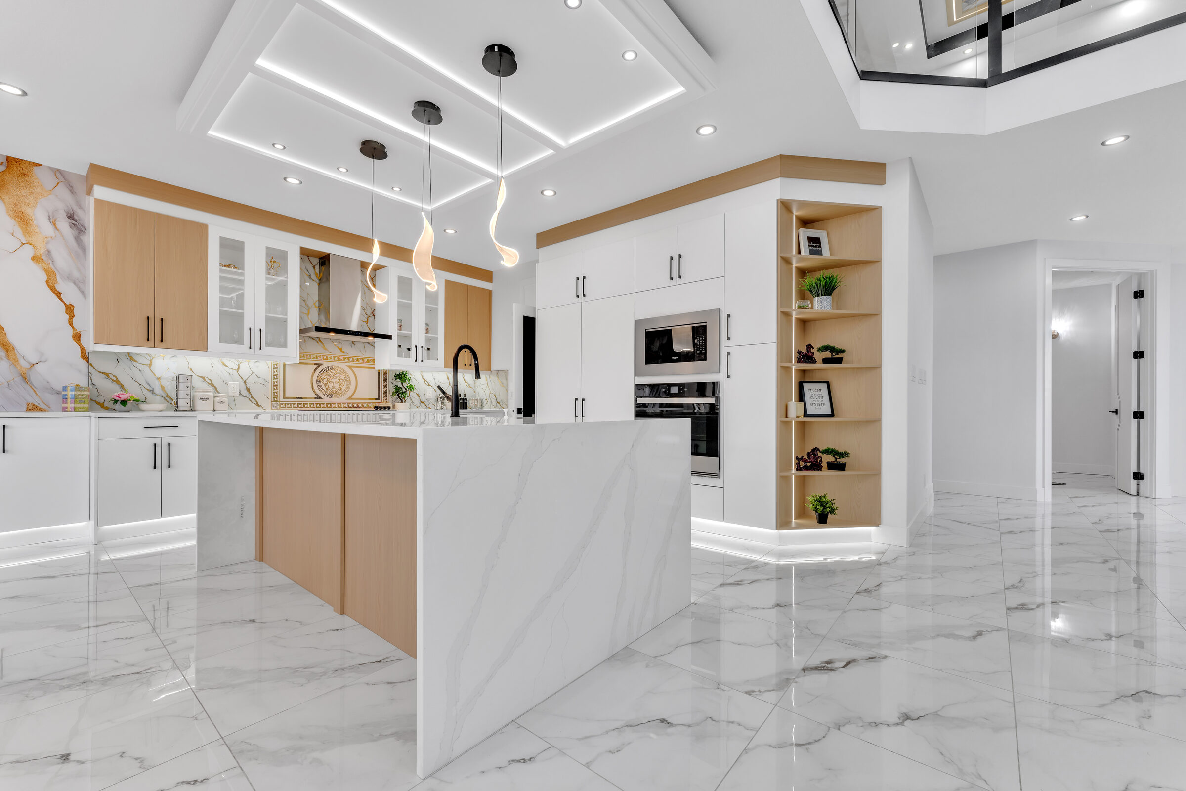 Kitchen with marble waterfall island